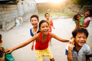 happy asian children in village