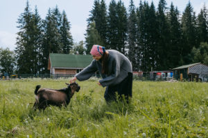 albanian woman with goat