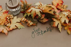 give thanks leaves on table